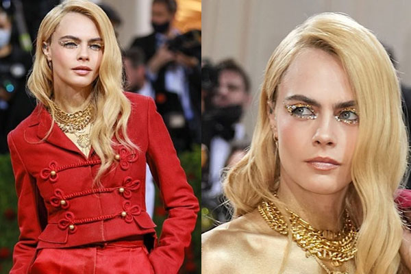 Cara Delevingne strips off to show gold-painted body on Met Gala red carpet mastram